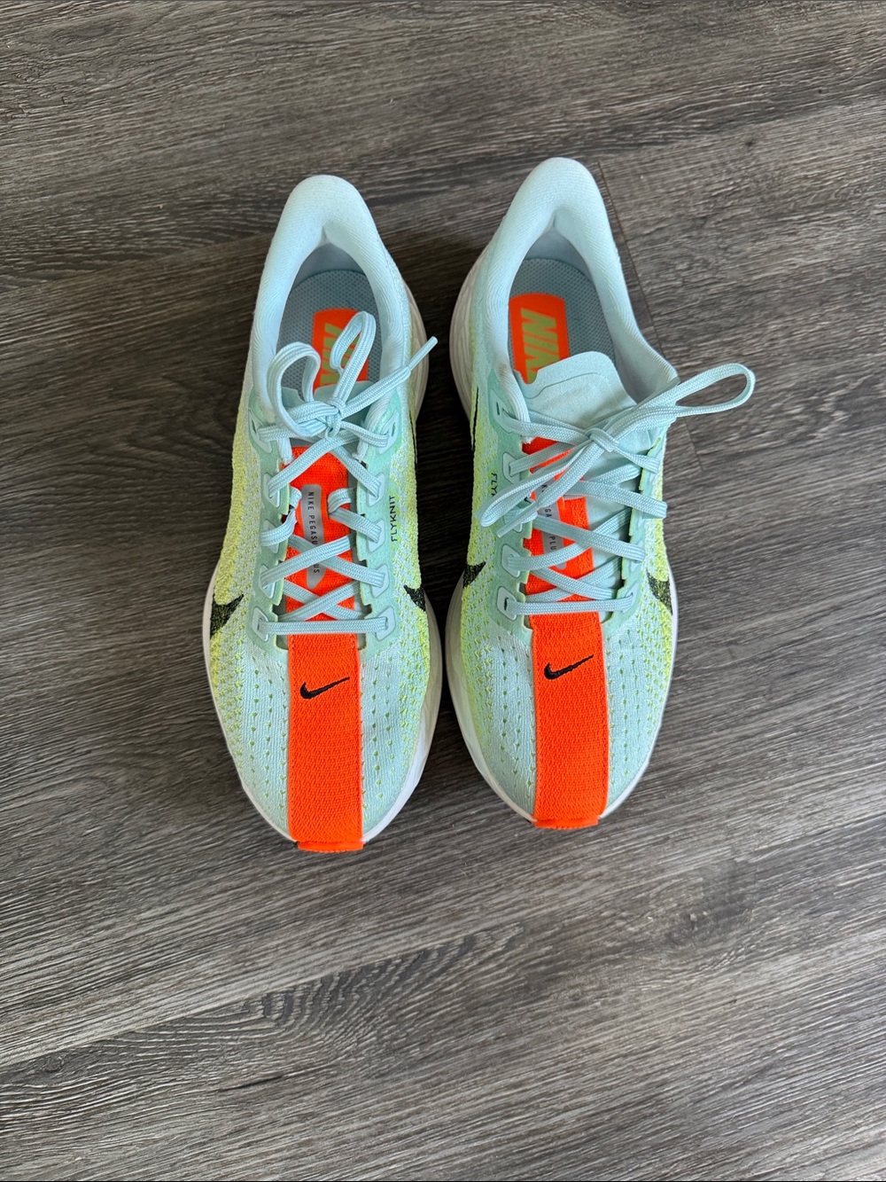 Nike Women’s Flyknit turbo Pegasus glacier blue and orange